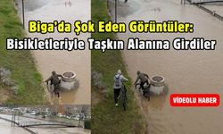Biga’da Şok Eden Görüntüler: Bisikletleriyle Taşkın Alanına Girdiler