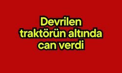 Devrilen traktörün altında can verdi