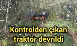 Kontrolden çıkan traktör devrildi