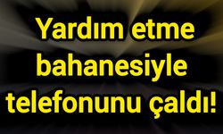 Yardım etme bahanesiyle telefonunu çaldı!