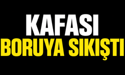 Kafası boruya sıkıştı